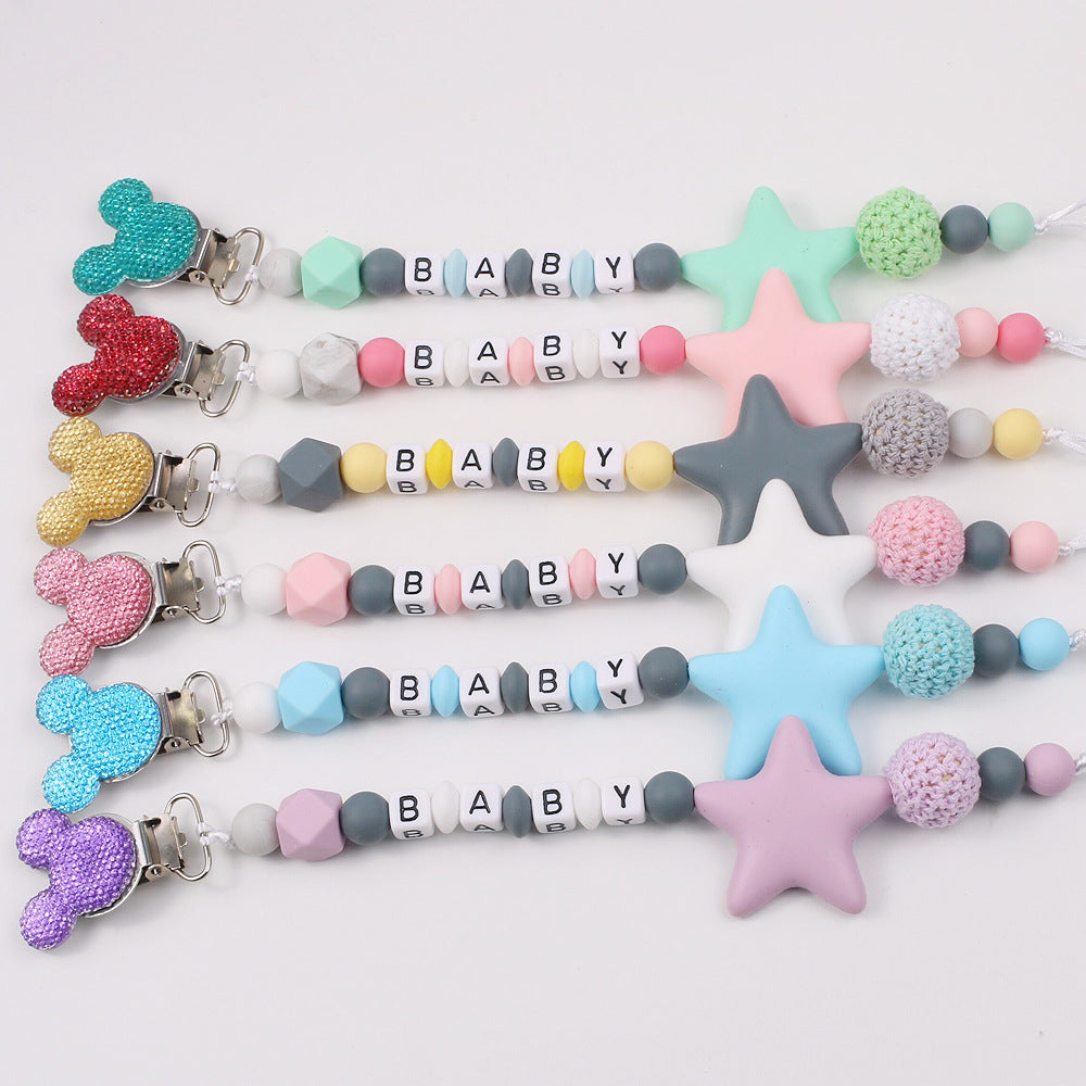 Disney-inspired pacifier clip with star silicone teether