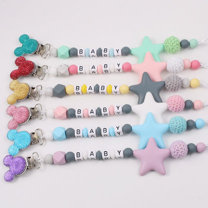 Disney-inspired pacifier clip with star silicone teether