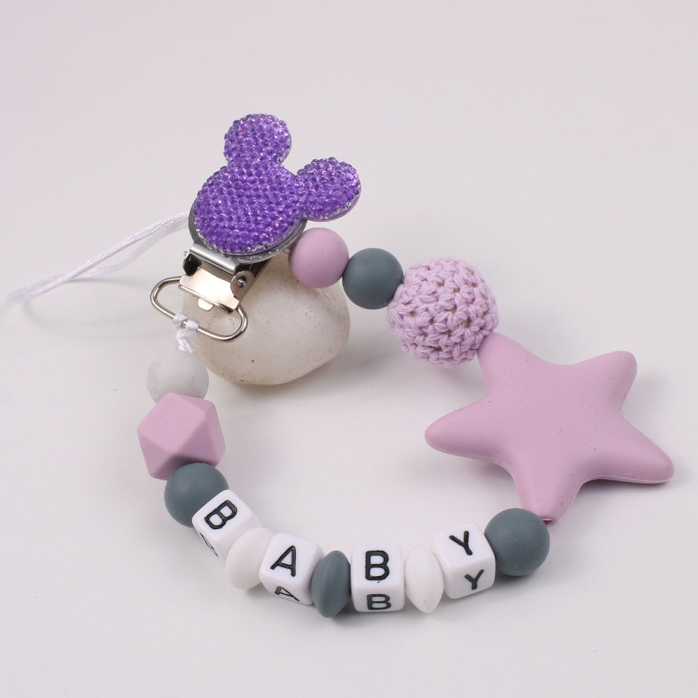 Disney-inspired pacifier clip with star silicone teether