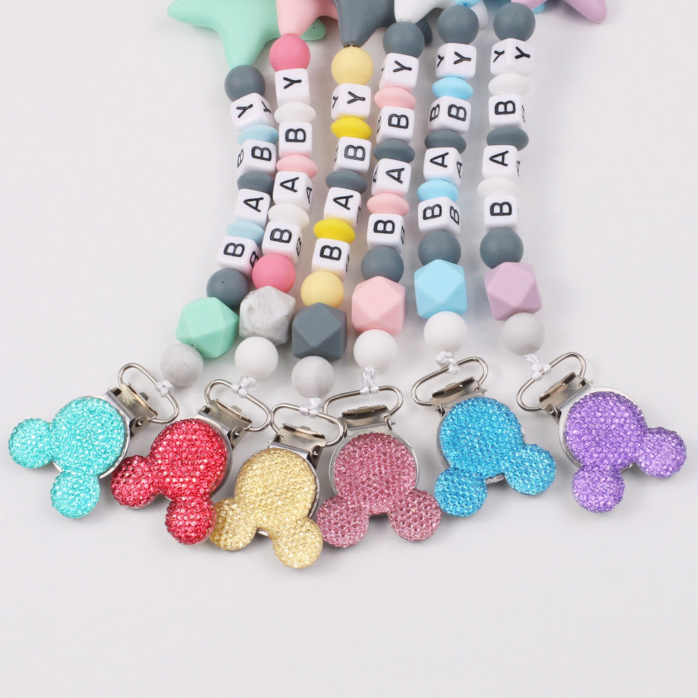 Disney-inspired pacifier clip with star silicone teether