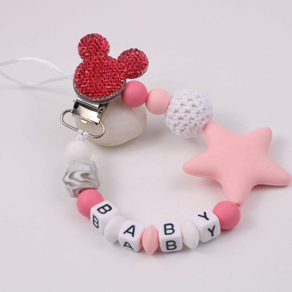 Disney-inspired pacifier clip with star silicone teether