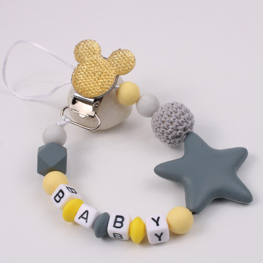 Disney-inspired pacifier clip with star silicone teether