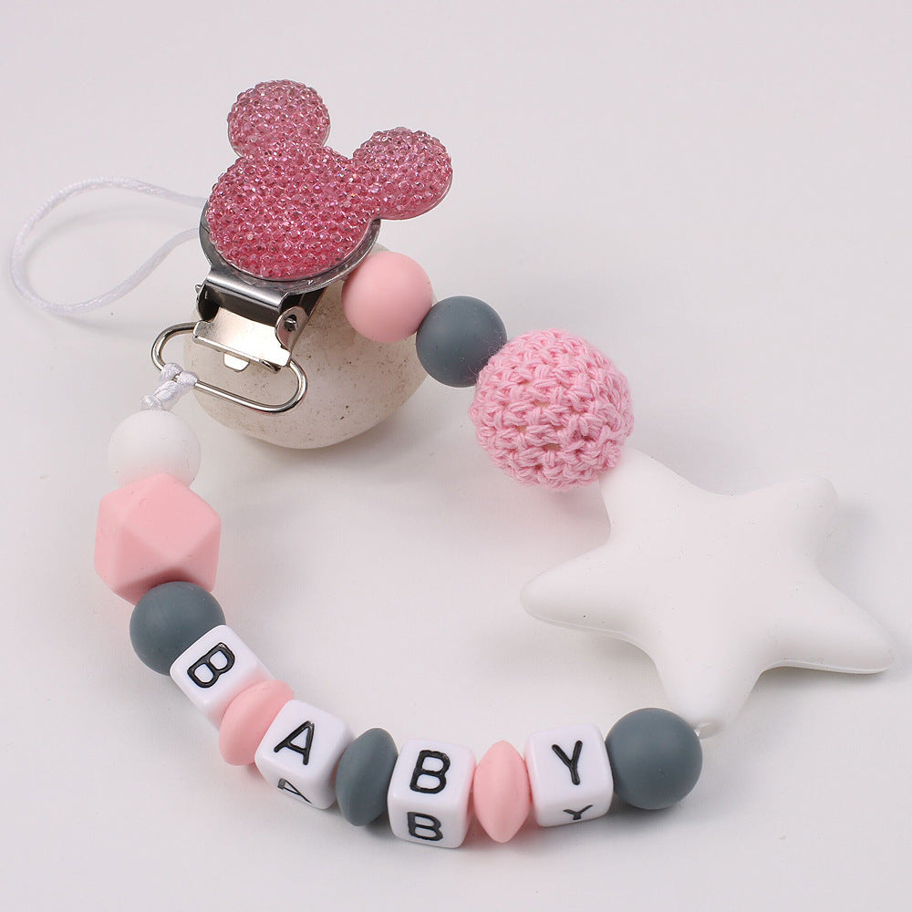 Disney-inspired pacifier clip with star silicone teether